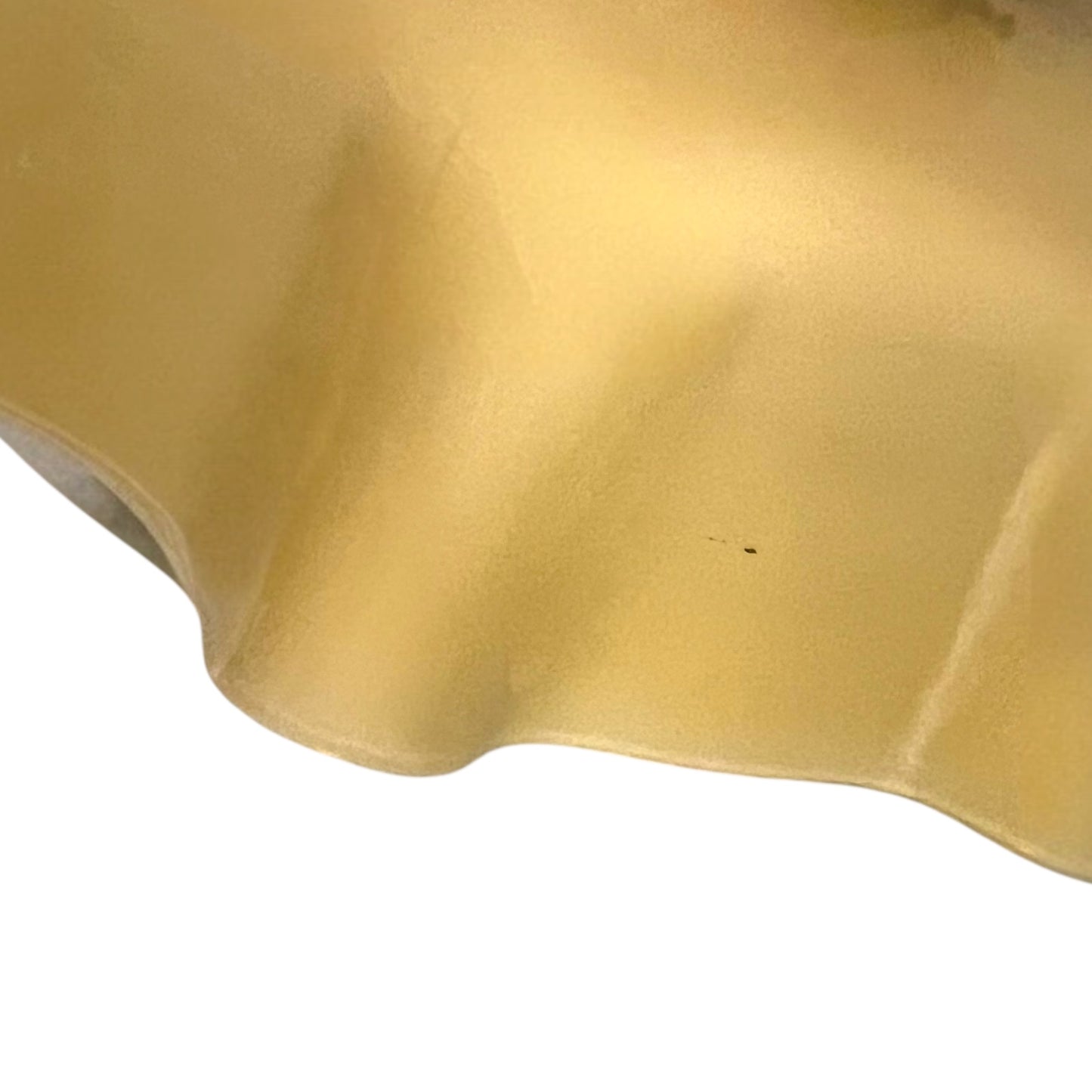 close up of Vintage-style pendant light with a yellow glass shade and brass fitting on a white background