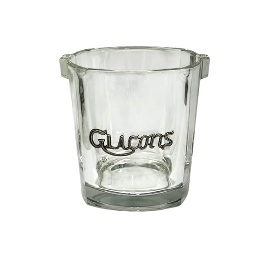 A clear glass ice bucket featuring the word Glacons' in a metal decoration on the front, set against a plain white background.
