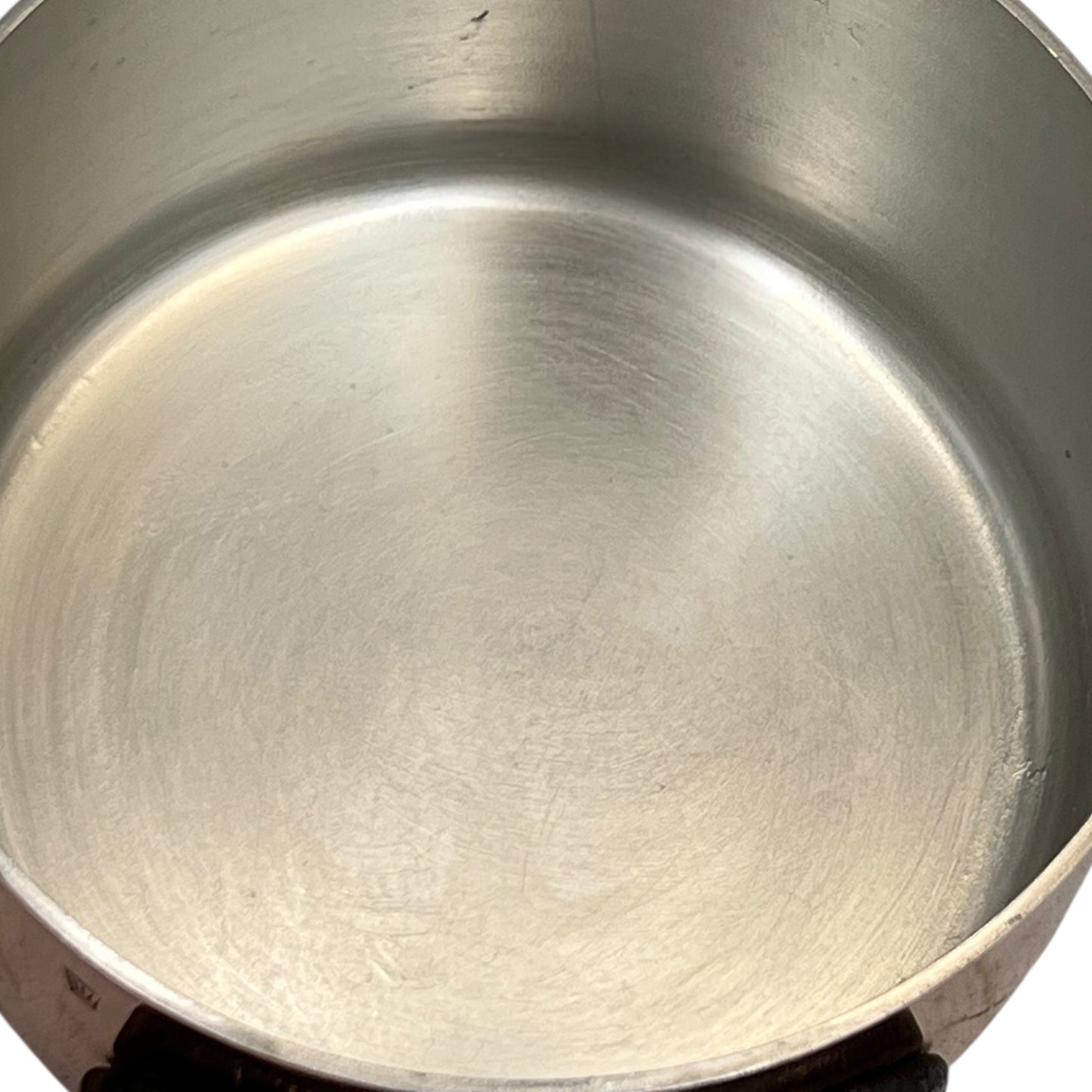 Close-up of a copper pot on a white background