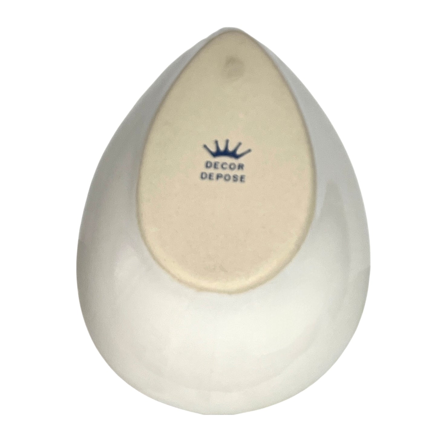 White teardrop-shaped object with 'Decor Depose' branding on a white background
