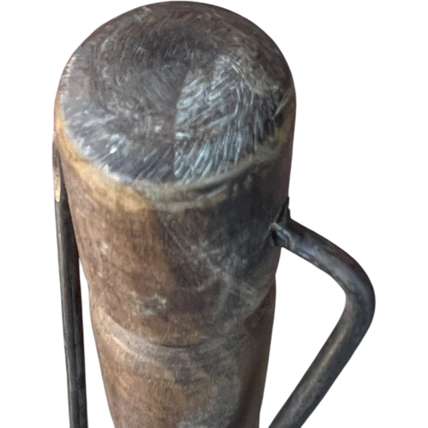 end of wooden handle from copper ladle