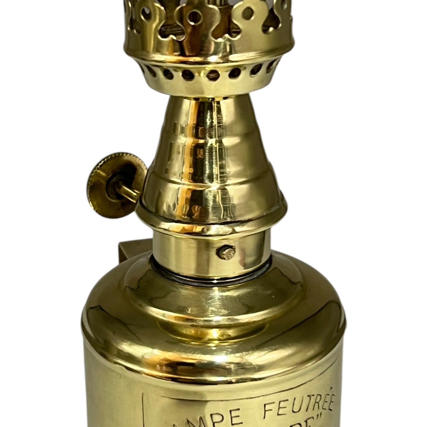 close up of brass oil lamp