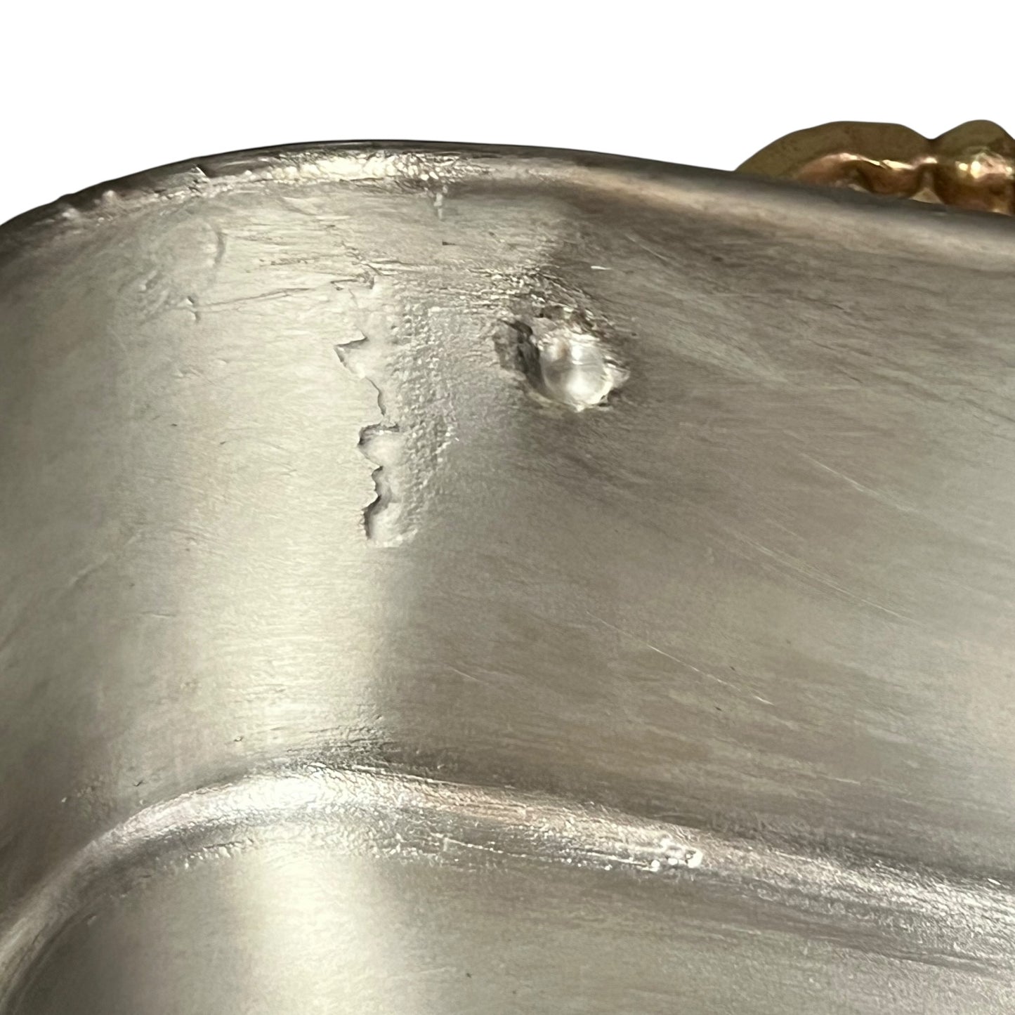 Close up of a Copper roasting pan with tin lining on a white background
