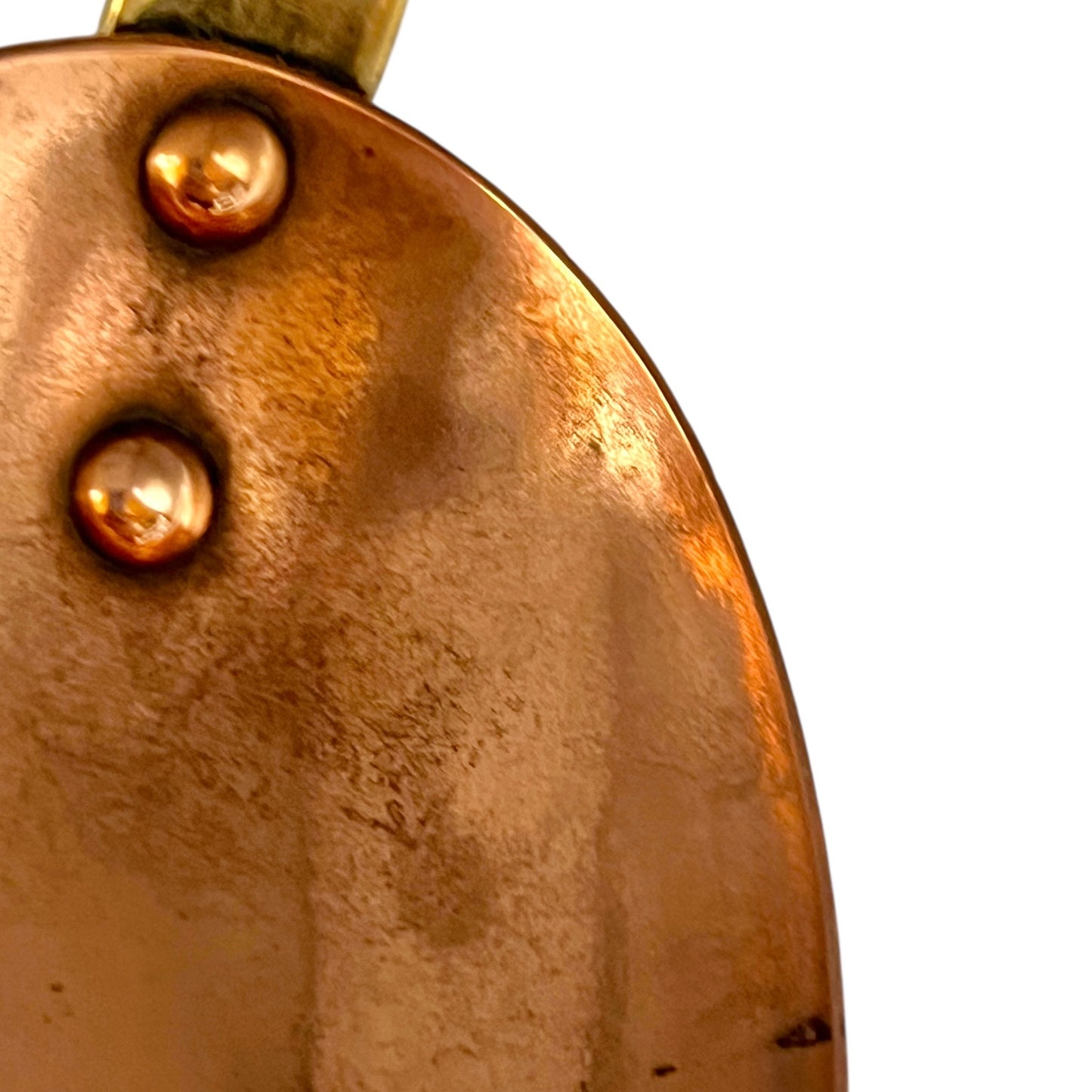 copper rivets on copper spoon