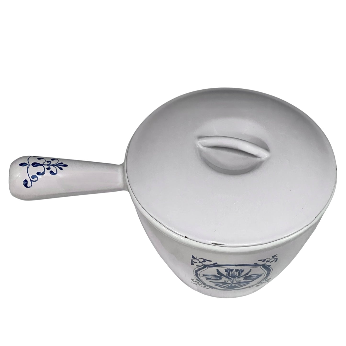 White enamelled cast iron pot with blue floral design and handle on a white background
