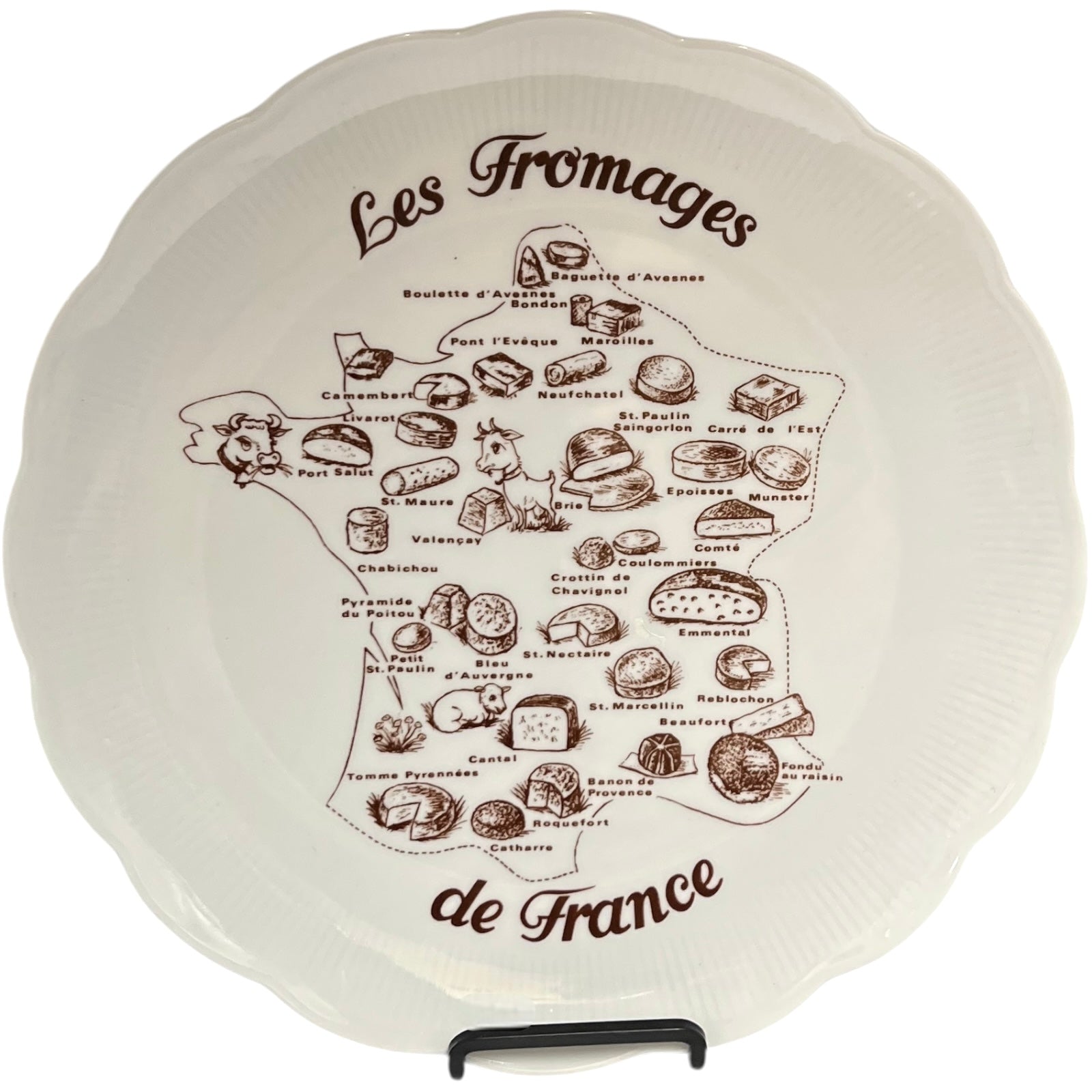 Decorative plate with illustrations of French cheeses and text 'Les Fromages de France' on a white background.