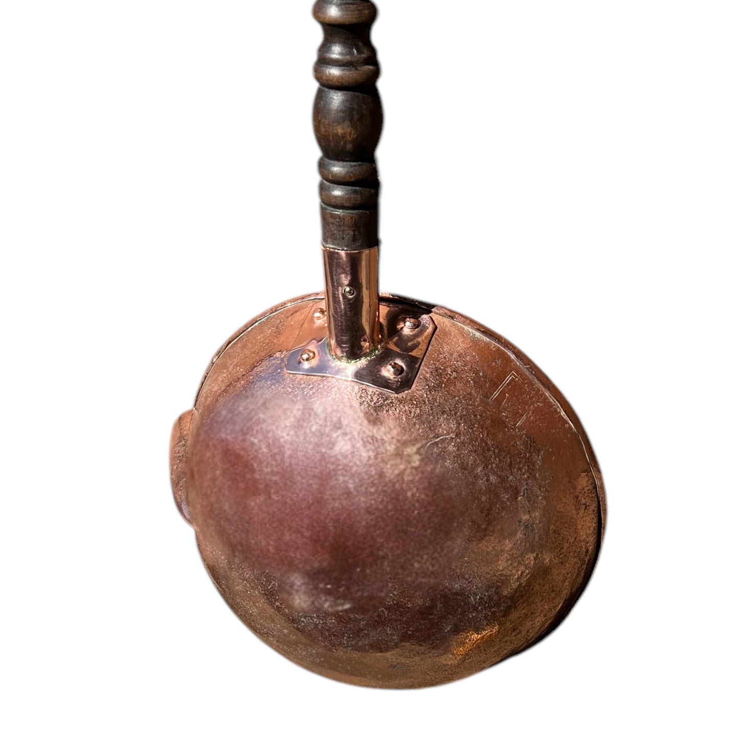 rear view of copper ladle