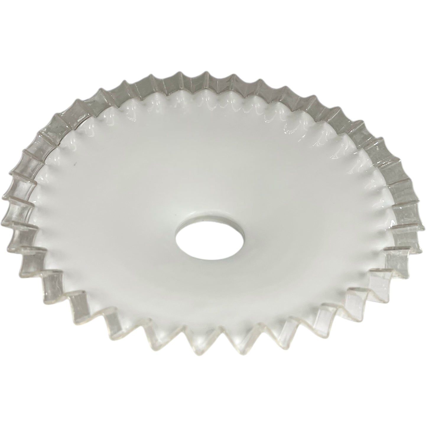 Underside of a white glass lightshade on a white background