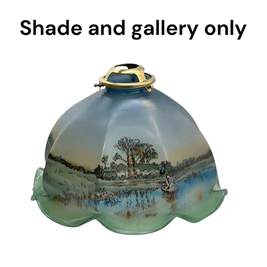 A vintage-style glass lamp shade with a hand-painted landscape scene, featuring a blue-green gradient, a gold metal top ring, and a scalloped lower edge, shown against a plain white background with the text 'Shade and gallery only' at the top.