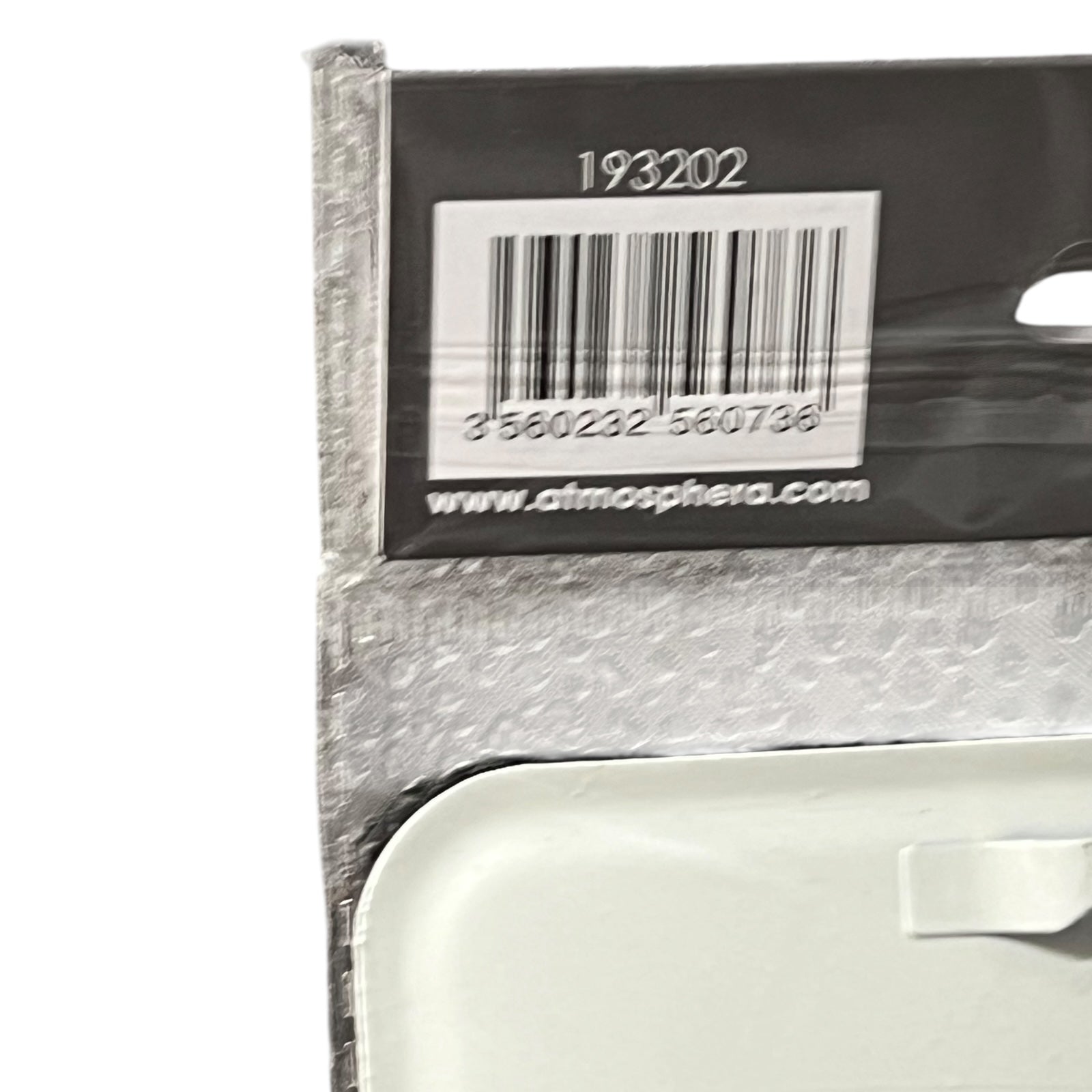 Bar code label on a product packaging with a visible brand name.