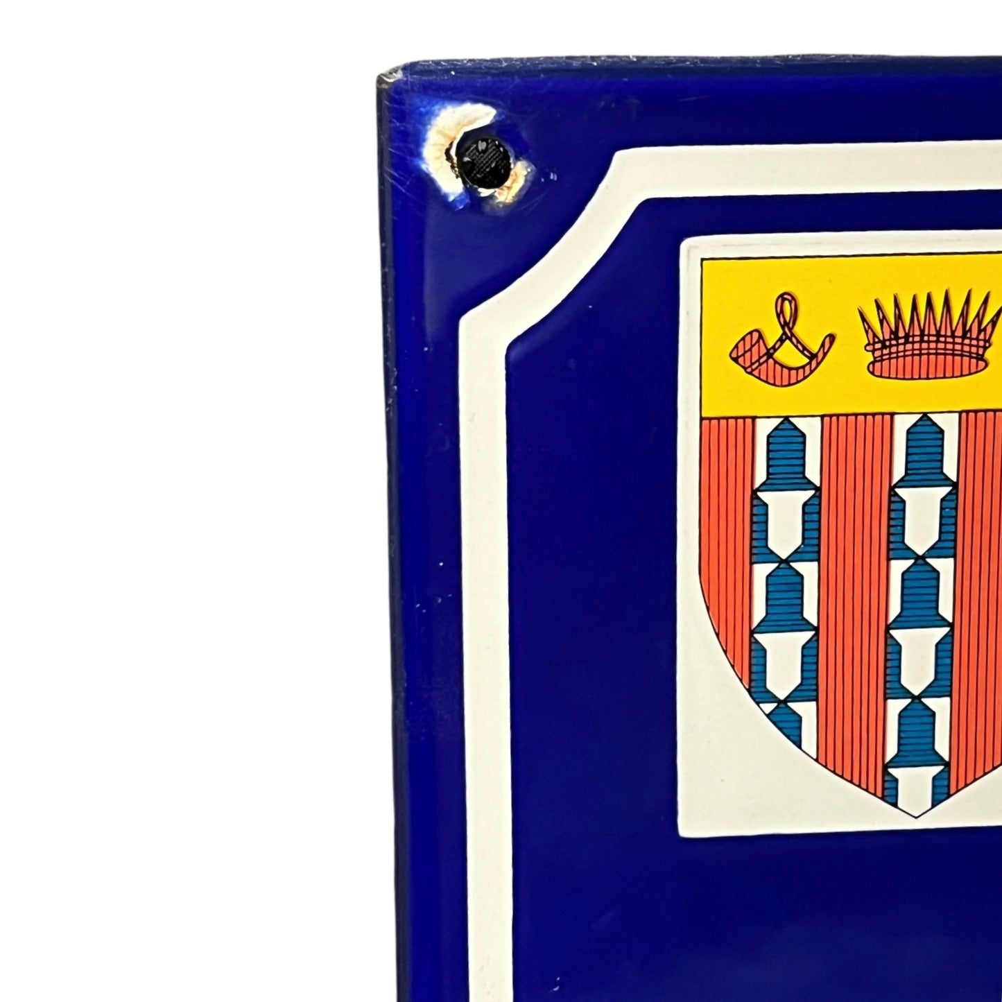 Decorative plaque with a coat of arms on a blue background