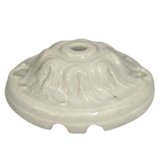White ceramic lamp ceiling rose with decorative patterns on a white background for sale from All Things French Store