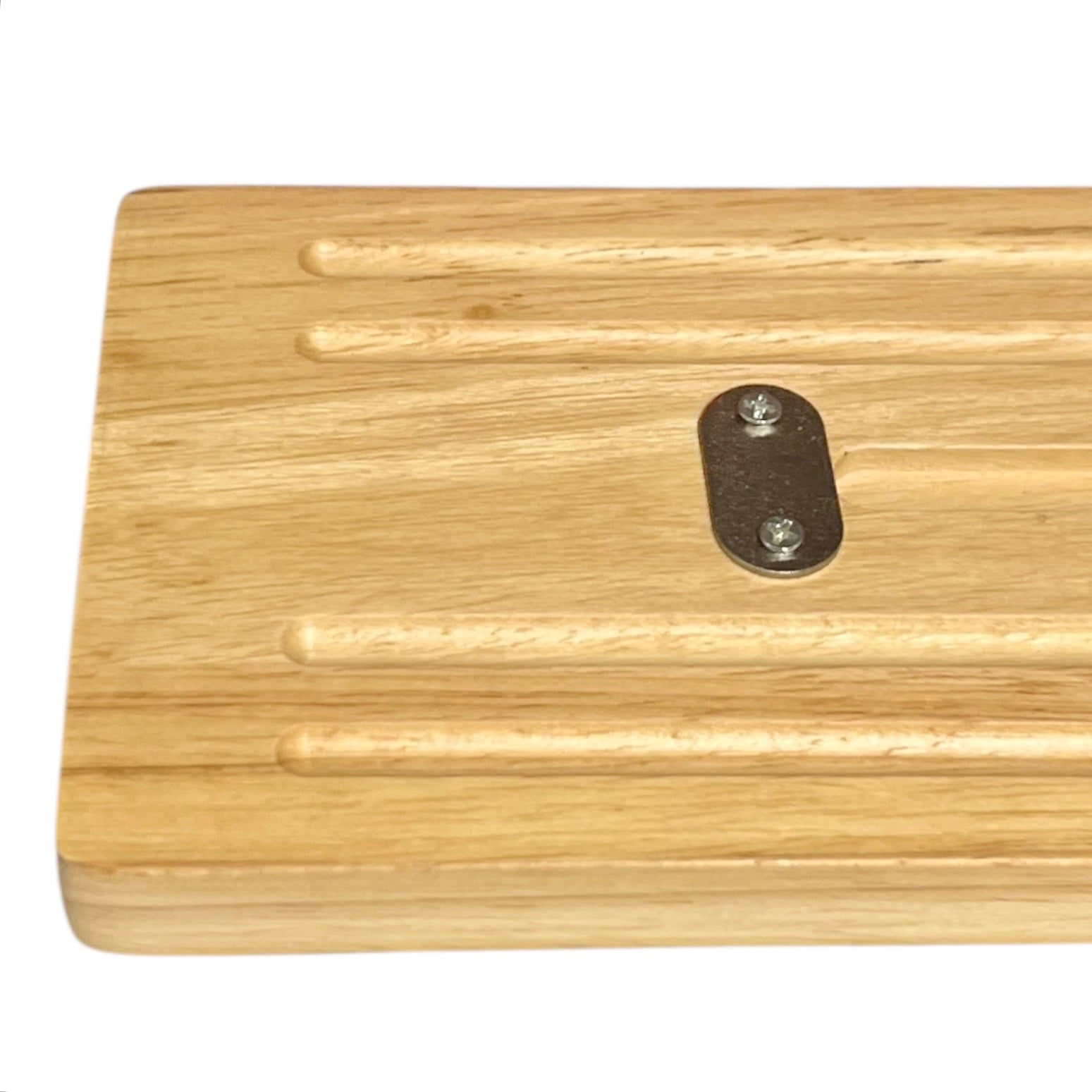 close up of baguette cutter on a white background