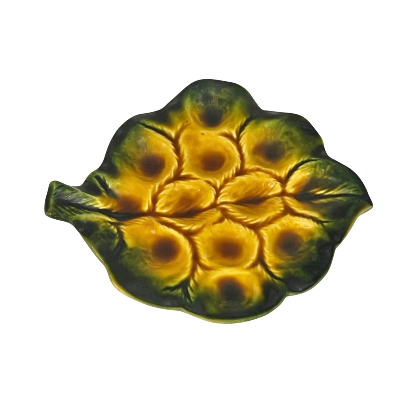 Yellow and green ceramic leaf-shaped snail escargots plate on a white background