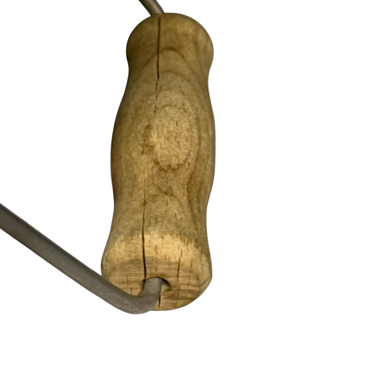 Wooden handle on a white churn on a white background