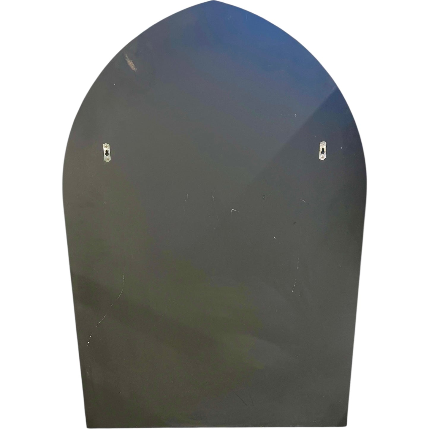 Black arch-shaped object on a white background