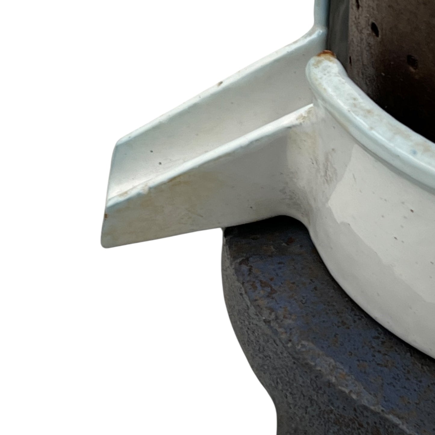 Close-up of a vintage French fruit press with an enamel pot on a white background