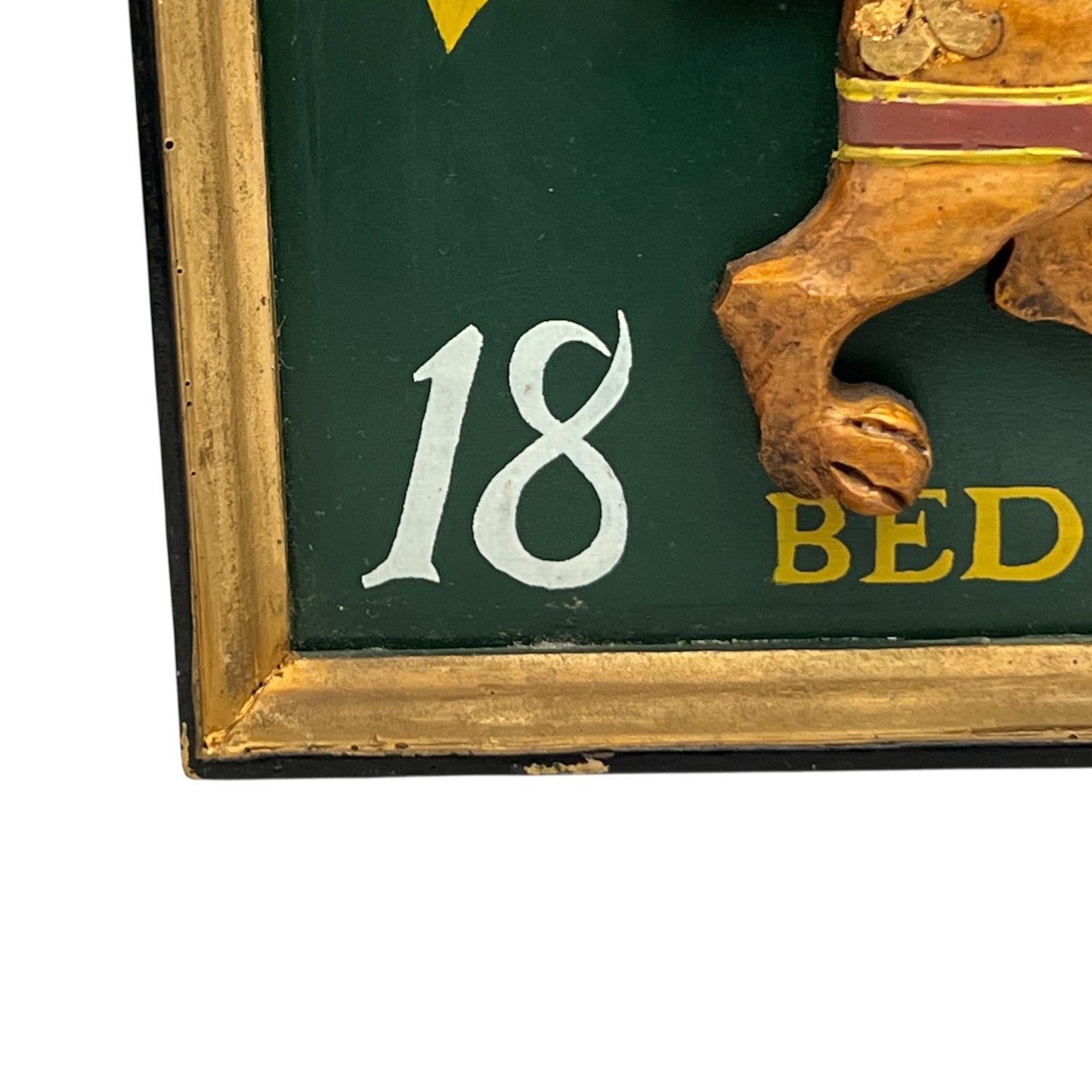 corner of lions den sign