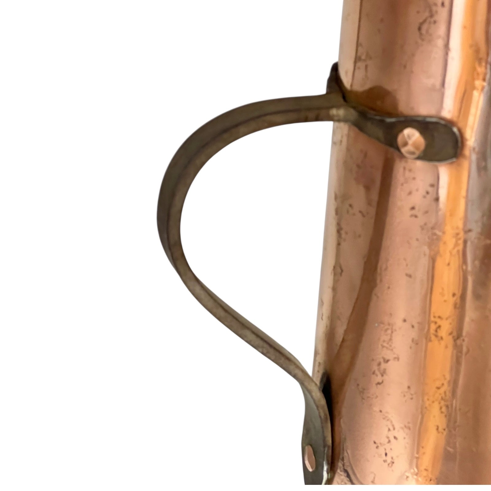 Close-up of a copper milk churn with a chain handle on a white background