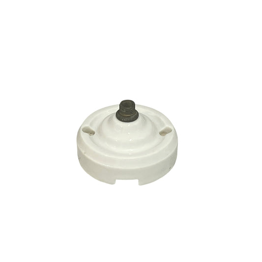 White French porcelain ceiling light rose fitting with a brass screw and 2 screw holes on a white background