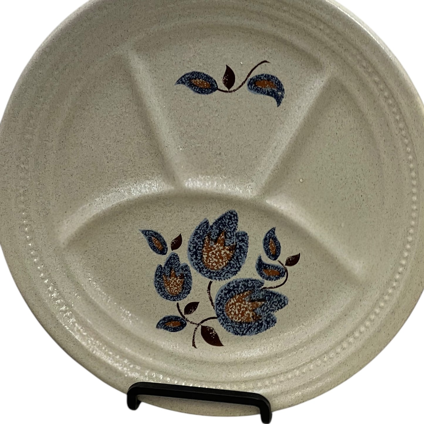 close up view of divided French vintage plate