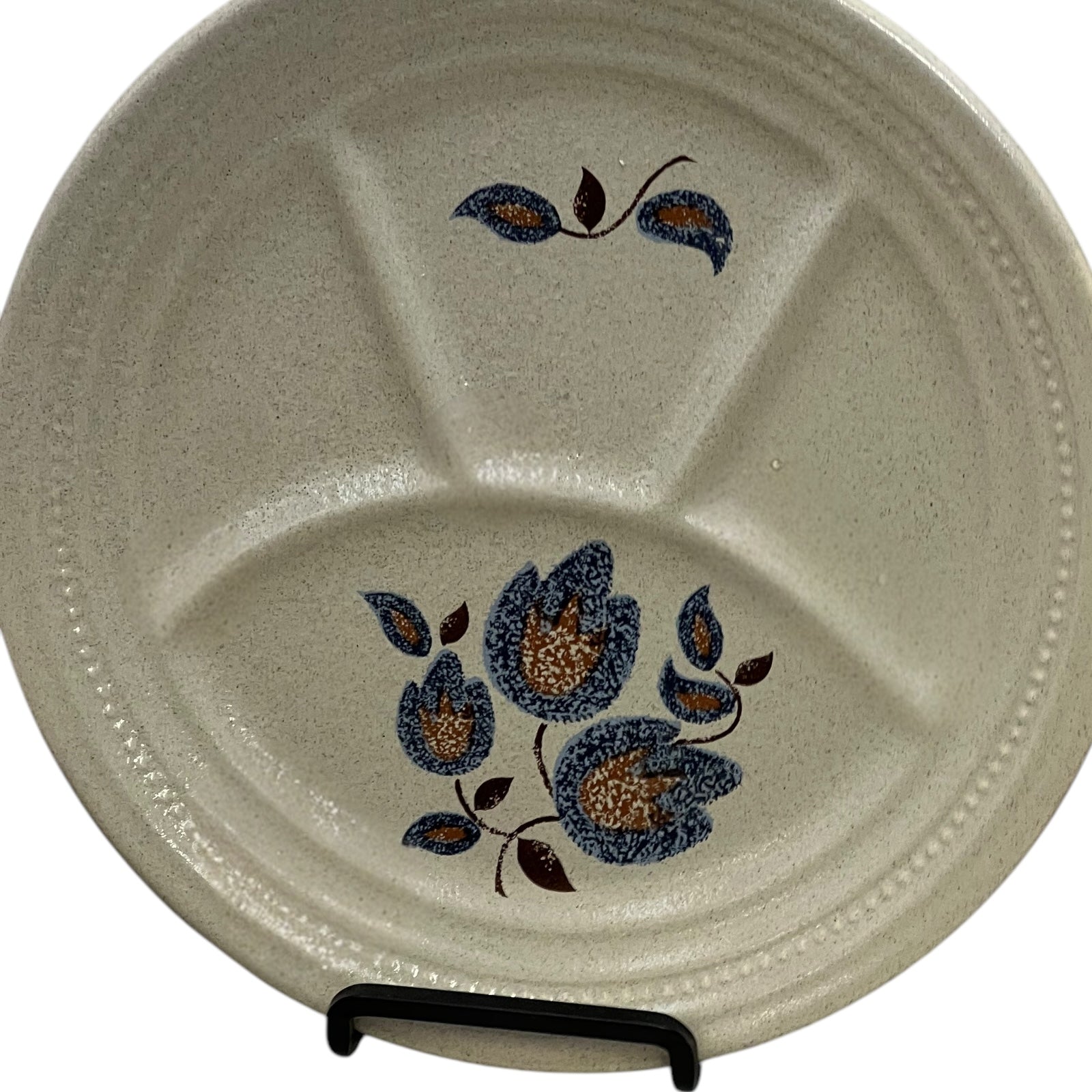 close up view of divided French vintage plate