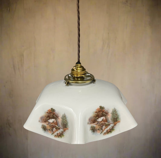 Vintage French Pendant Light, White Milk Glass with a rustic country pattern, brown twisted wiring and brass fittings on a textured brown background
