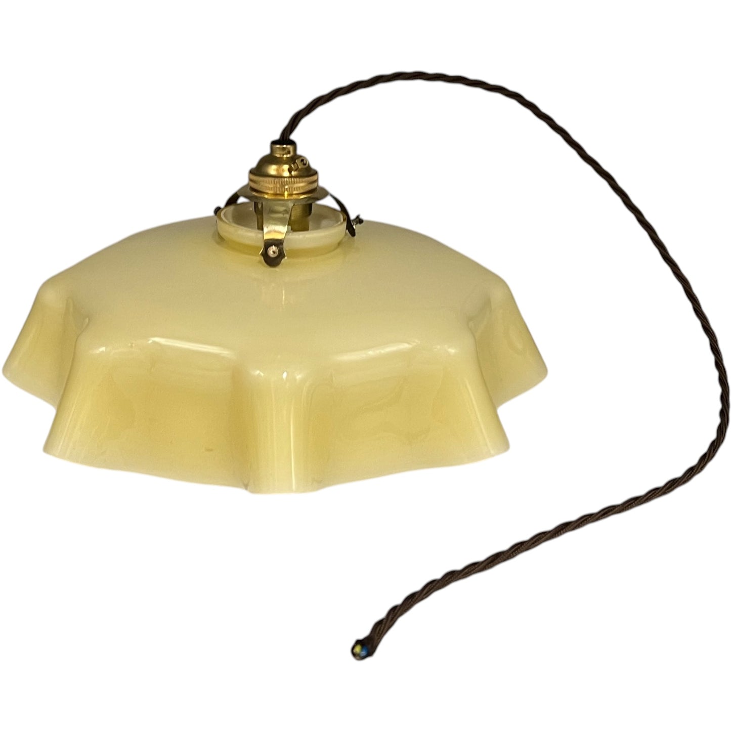 Vintage-style ceiling light fixture with dusk yellow glass shade on a white background