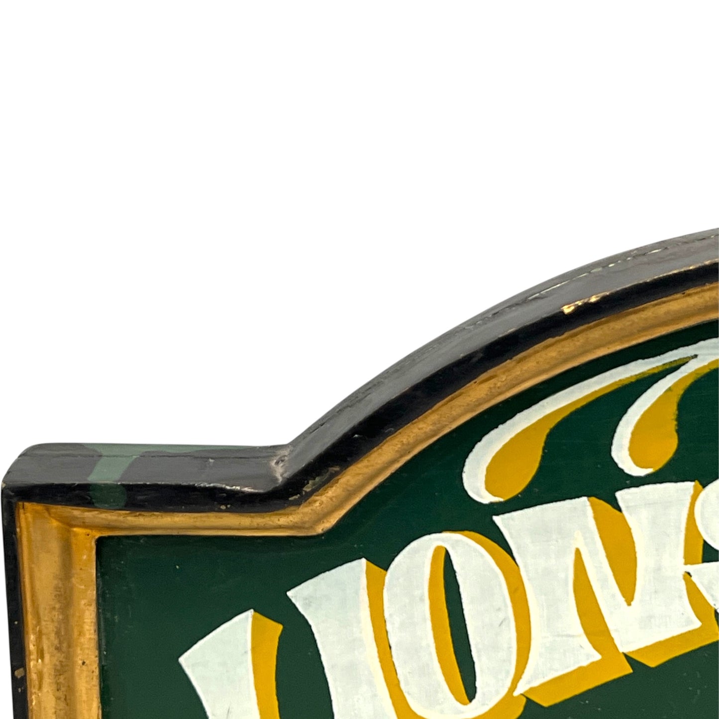 top corner of lions den sign
