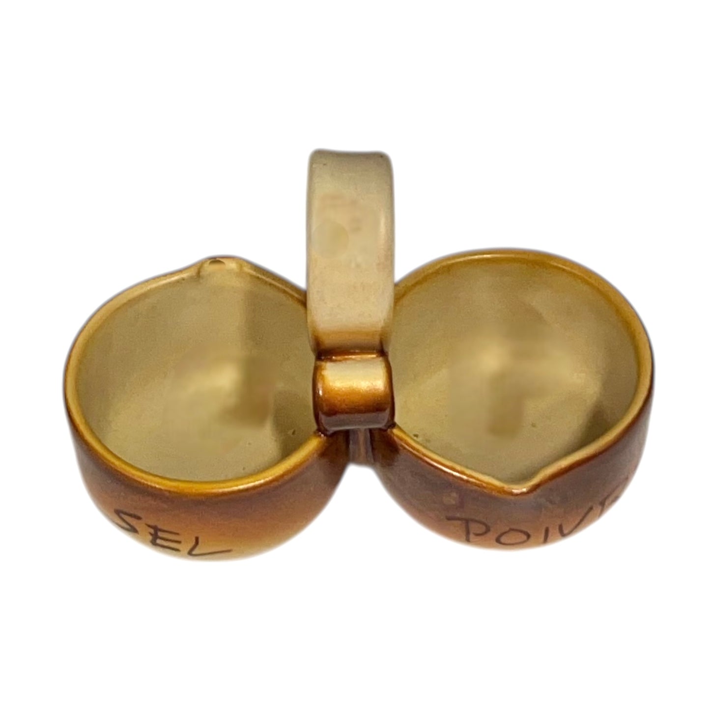 Ceramic salt and pepper shaker set with 'SEL' and 'POIVRE' writing on a white background