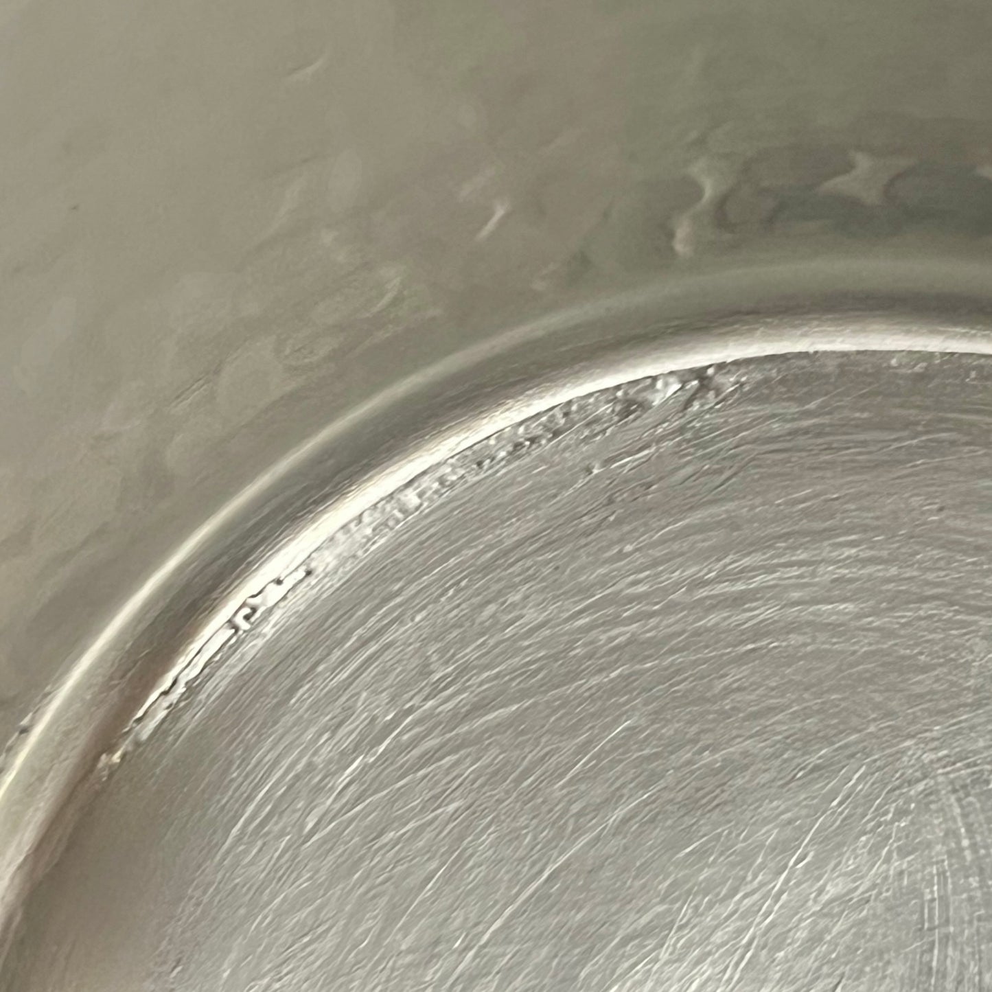close up image of copper pan tin lining