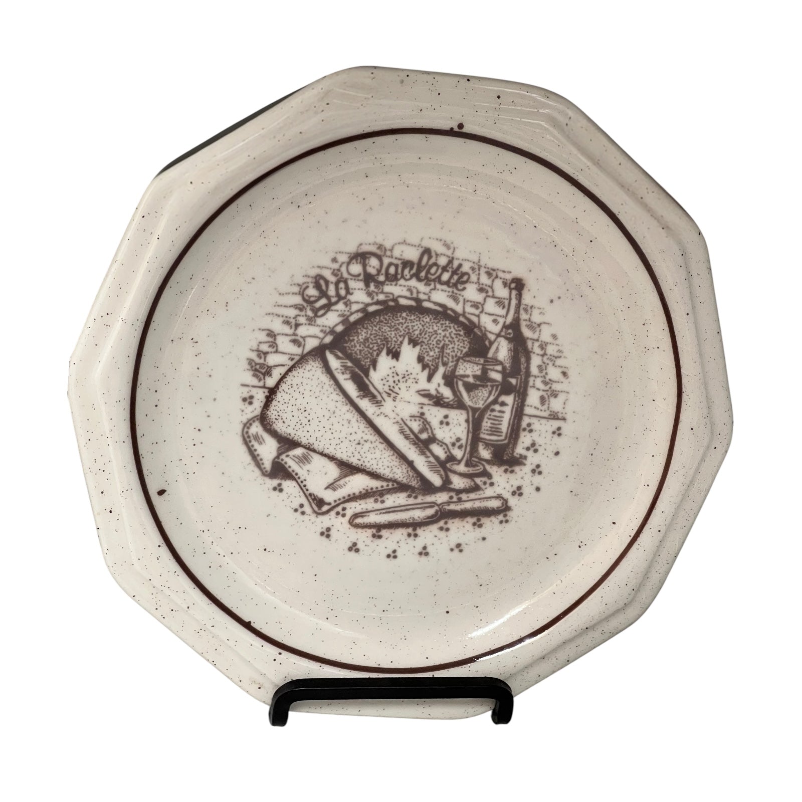 La Raclette plates with a decorative design on a white background