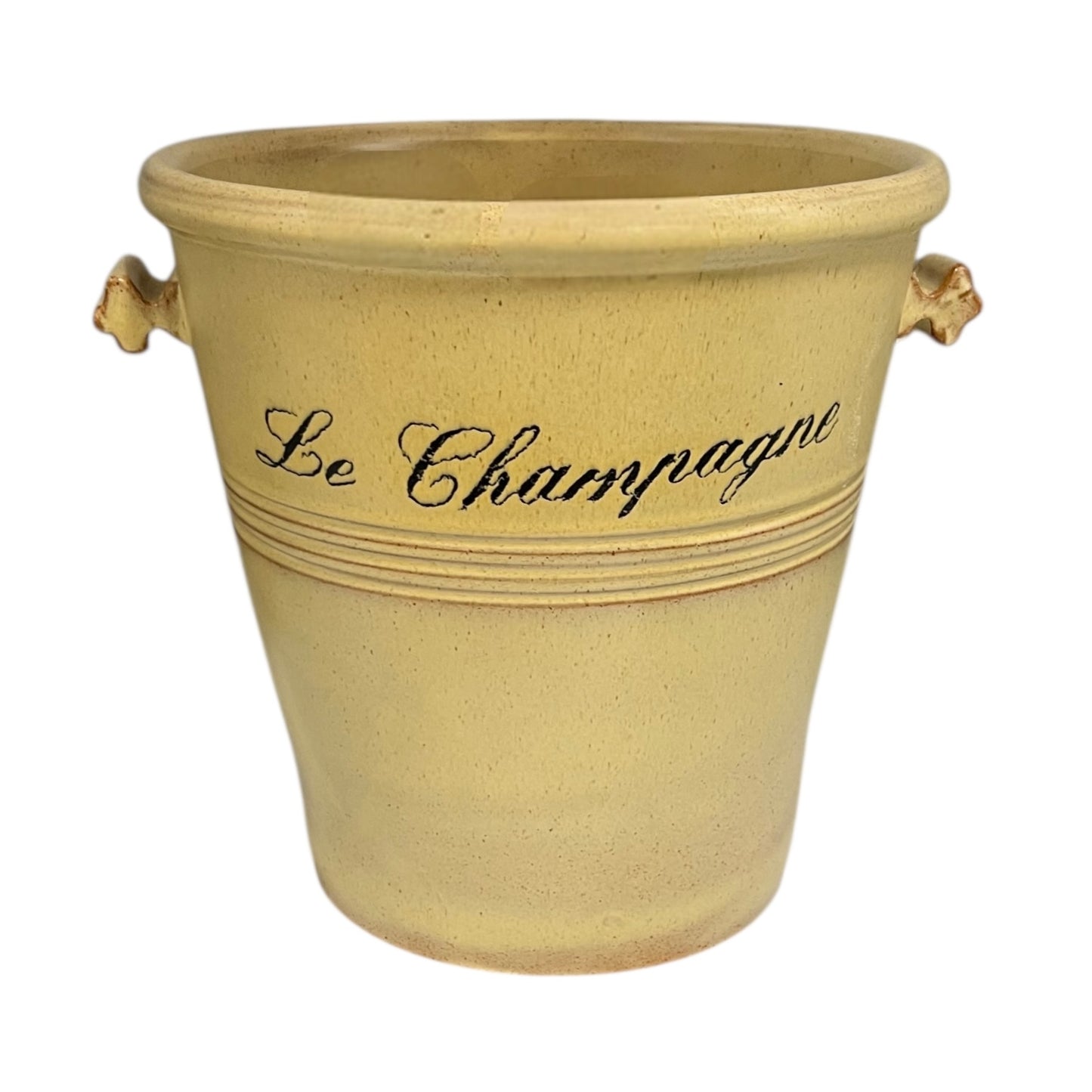 Beige ceramic ice bucket with 'Le Champagne' text on a white background