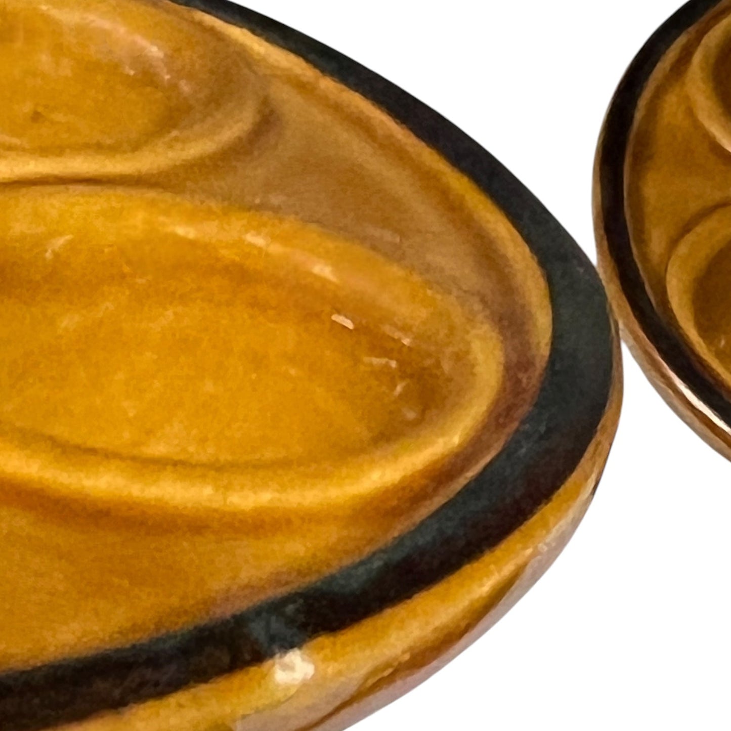 detail view of Vintage Snail Pots Plates