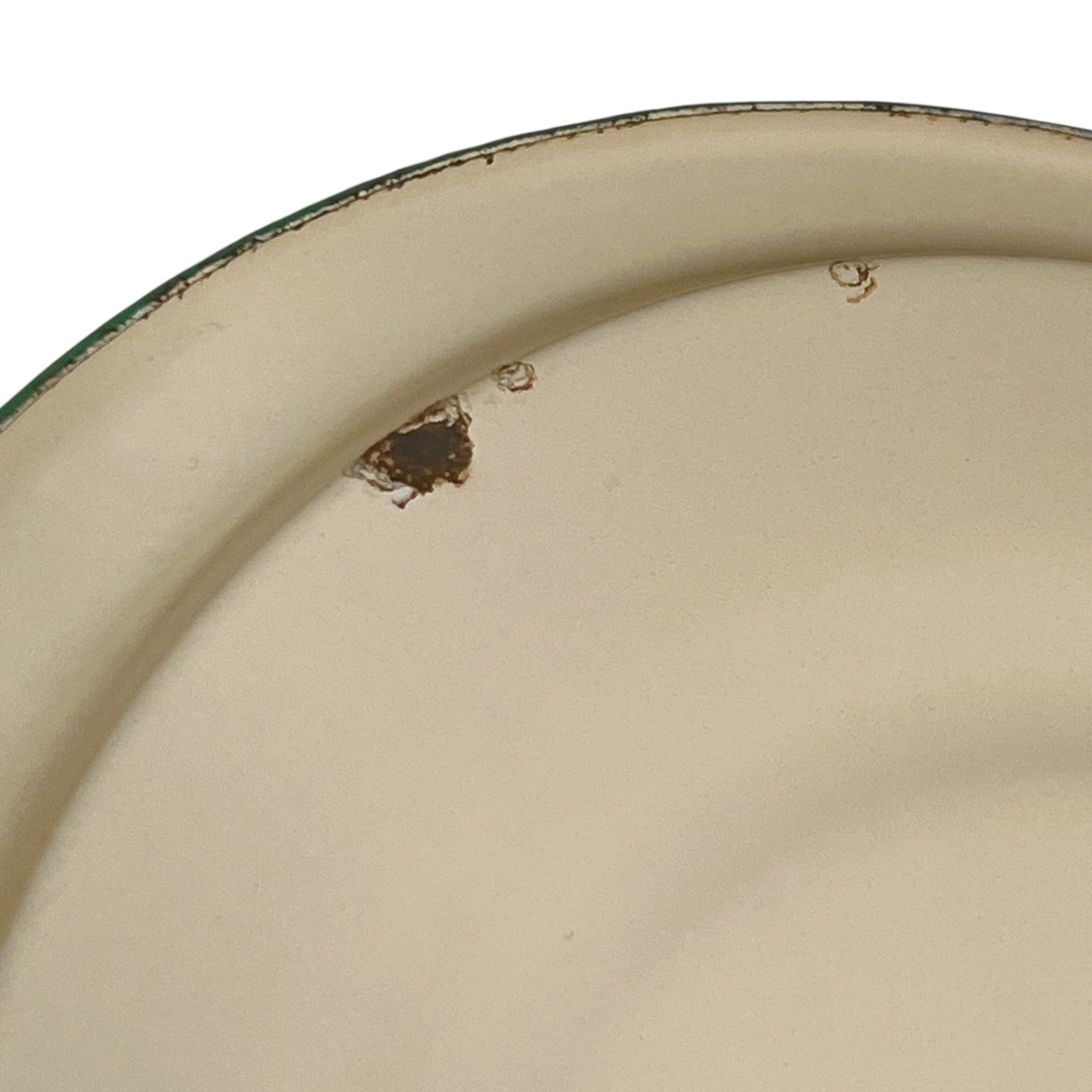 Close up of French vintage cream and green enamel bucket with a lid and handle on a white background