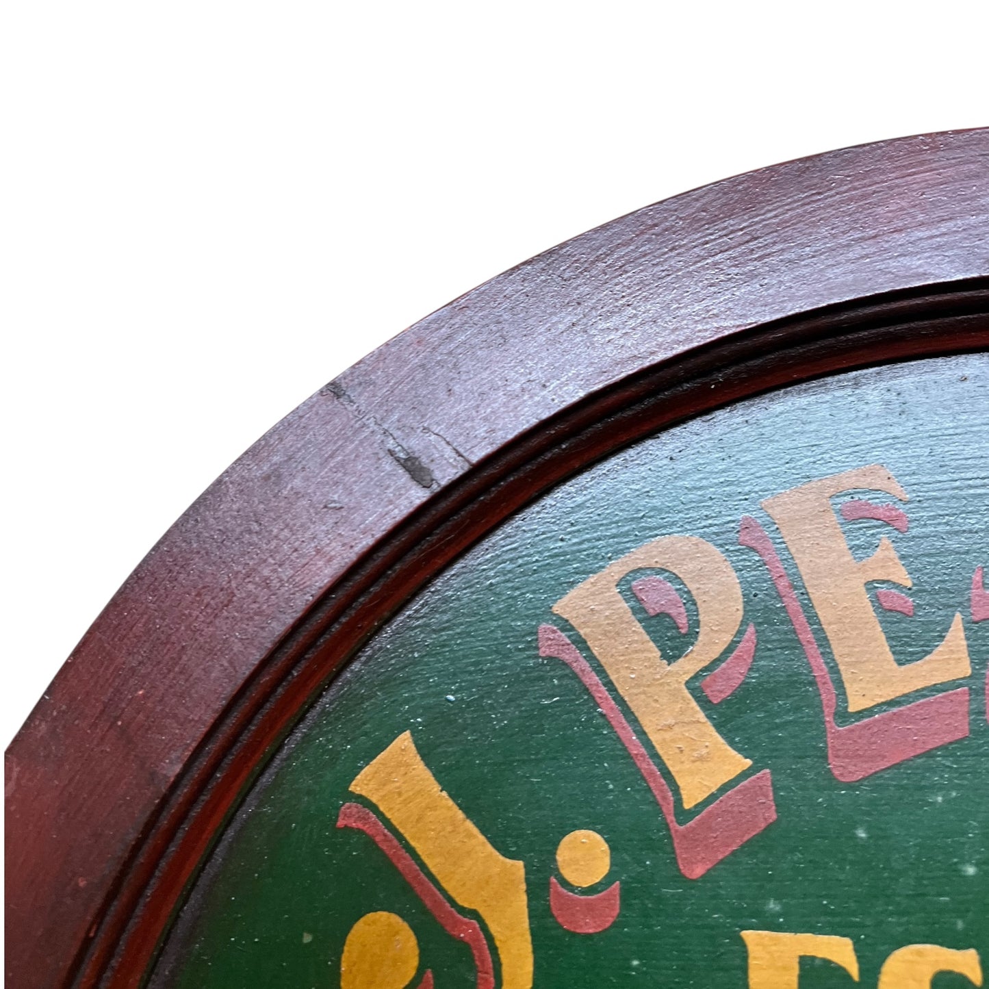 Close-up of a vintage-style clock with 'J.P. Eddy' branding on a white background