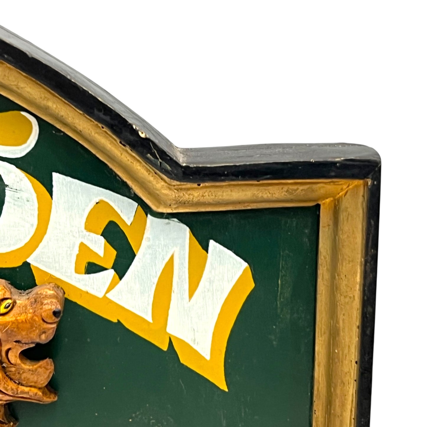 corner of lions den sign