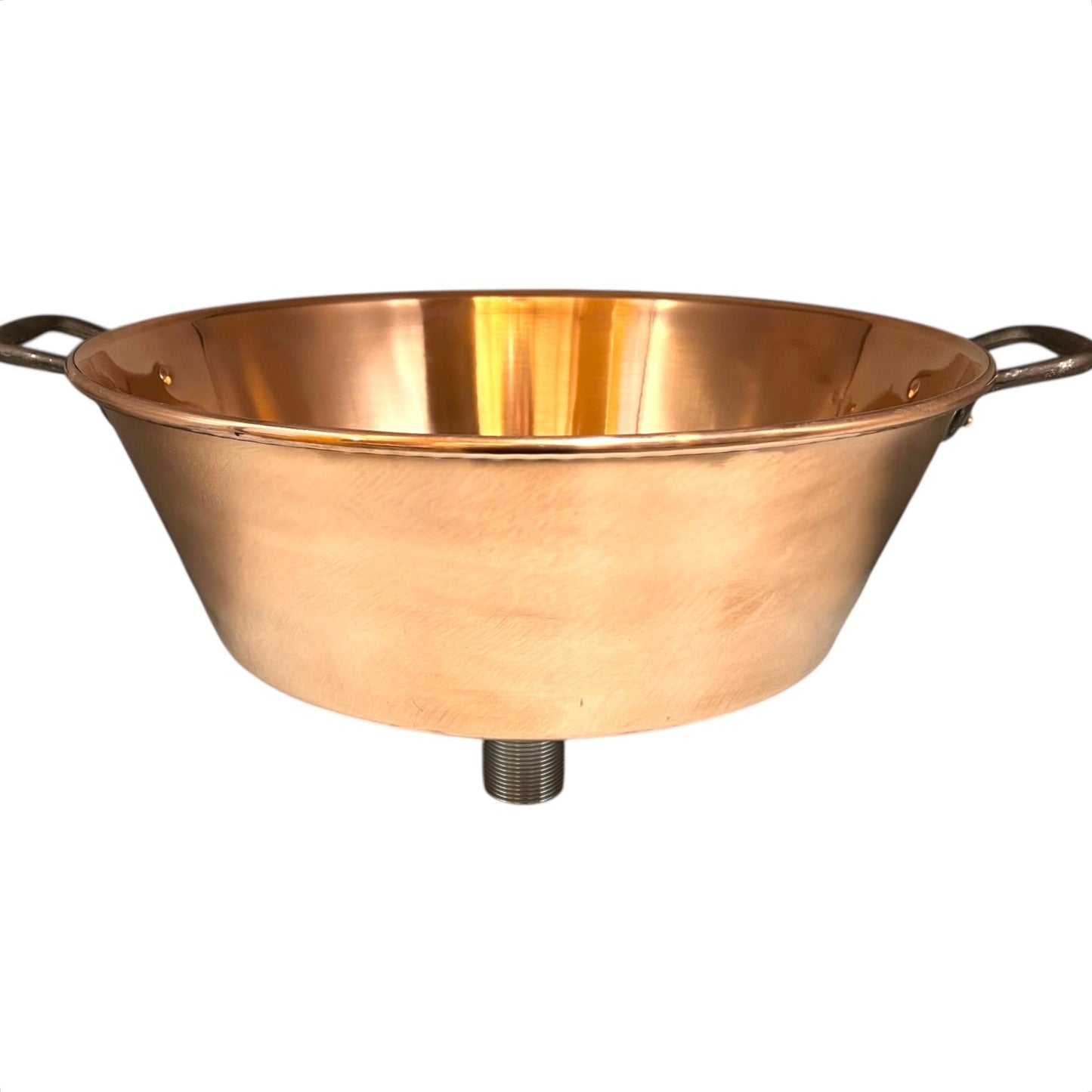 French copper bowl upcycled into a copper sink with iron handles and a chrome pop up waste on a white background