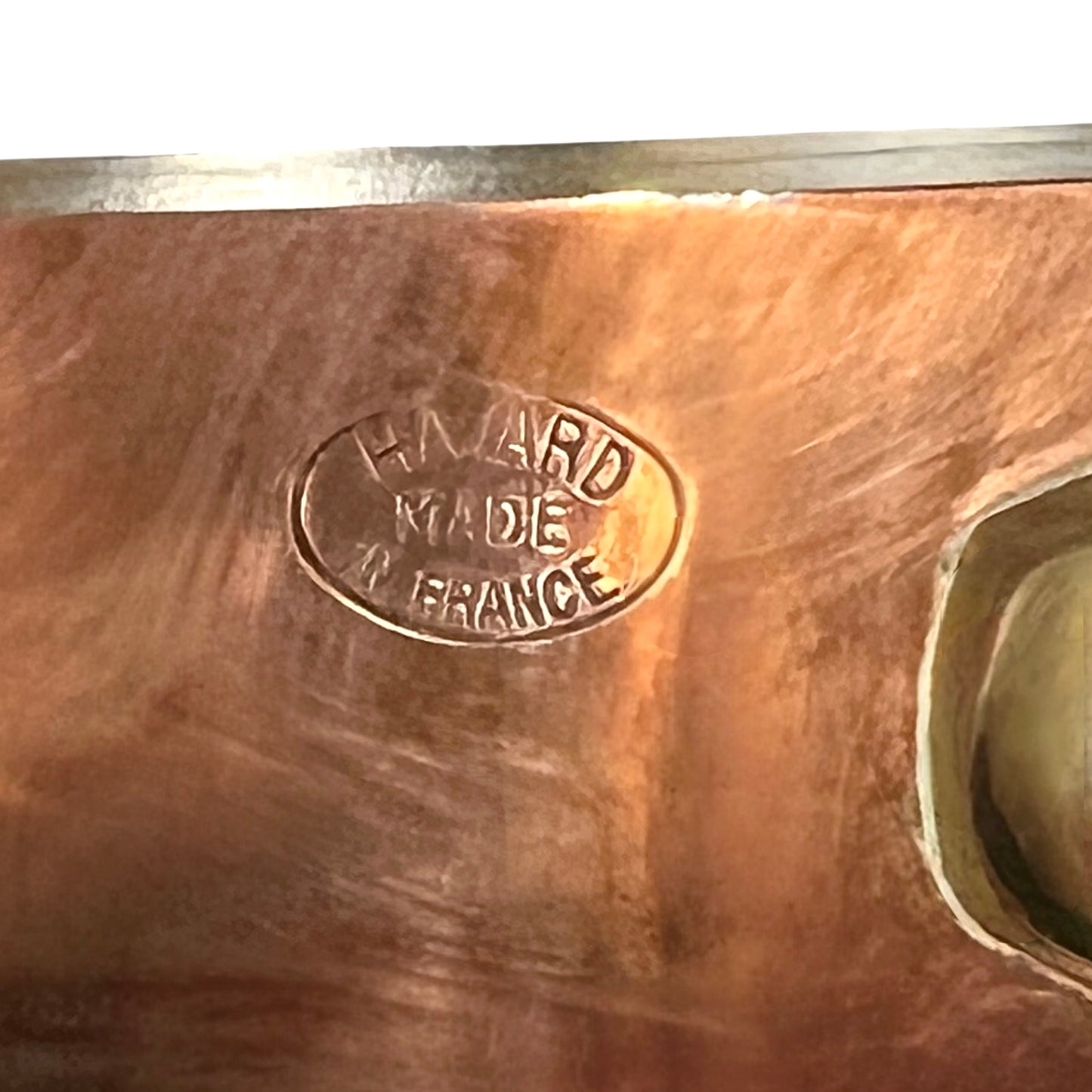 Copper object with 'Havard Made in France' stamp on a white background