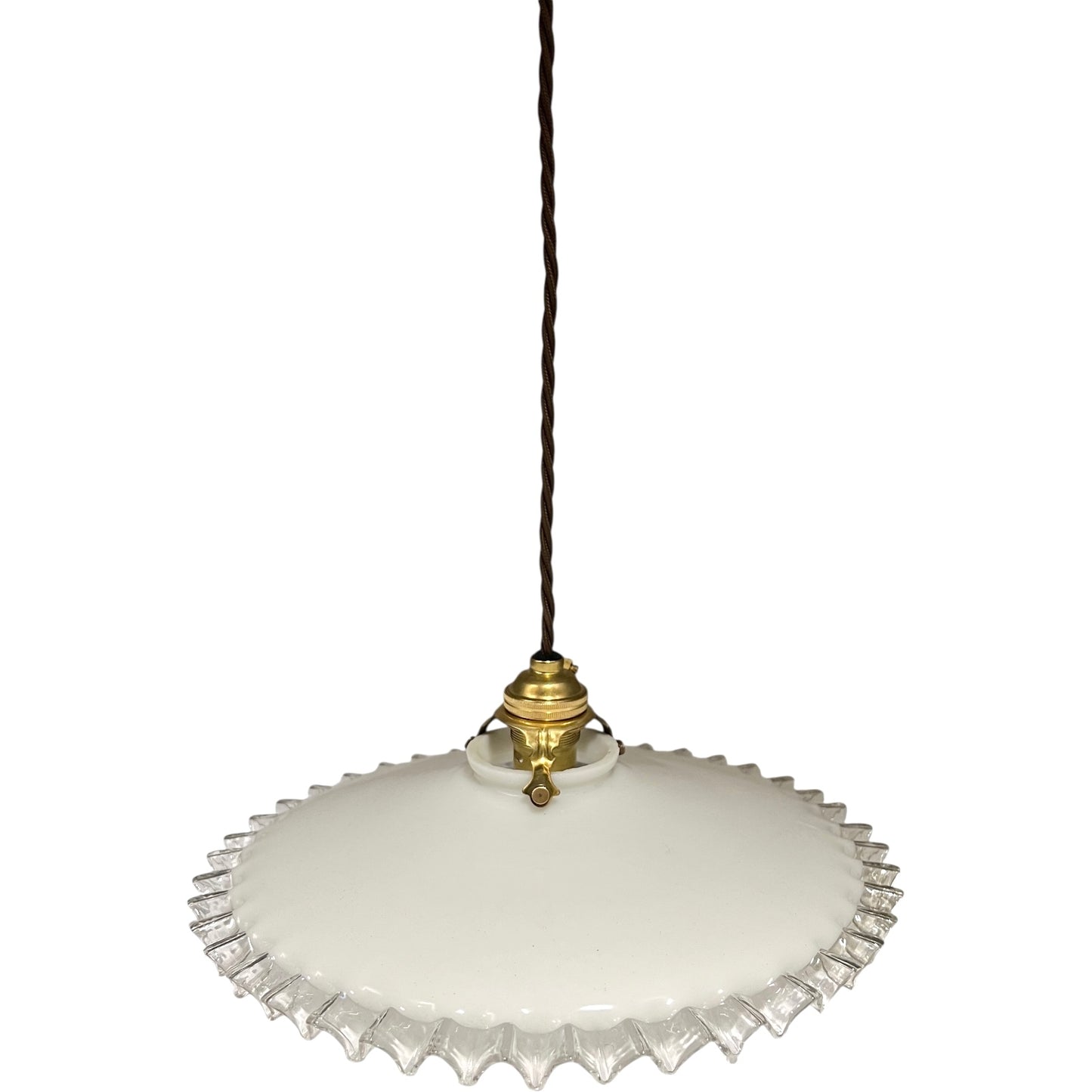 Vintage-style pendant light with white glass shade and brass fitting on a white background