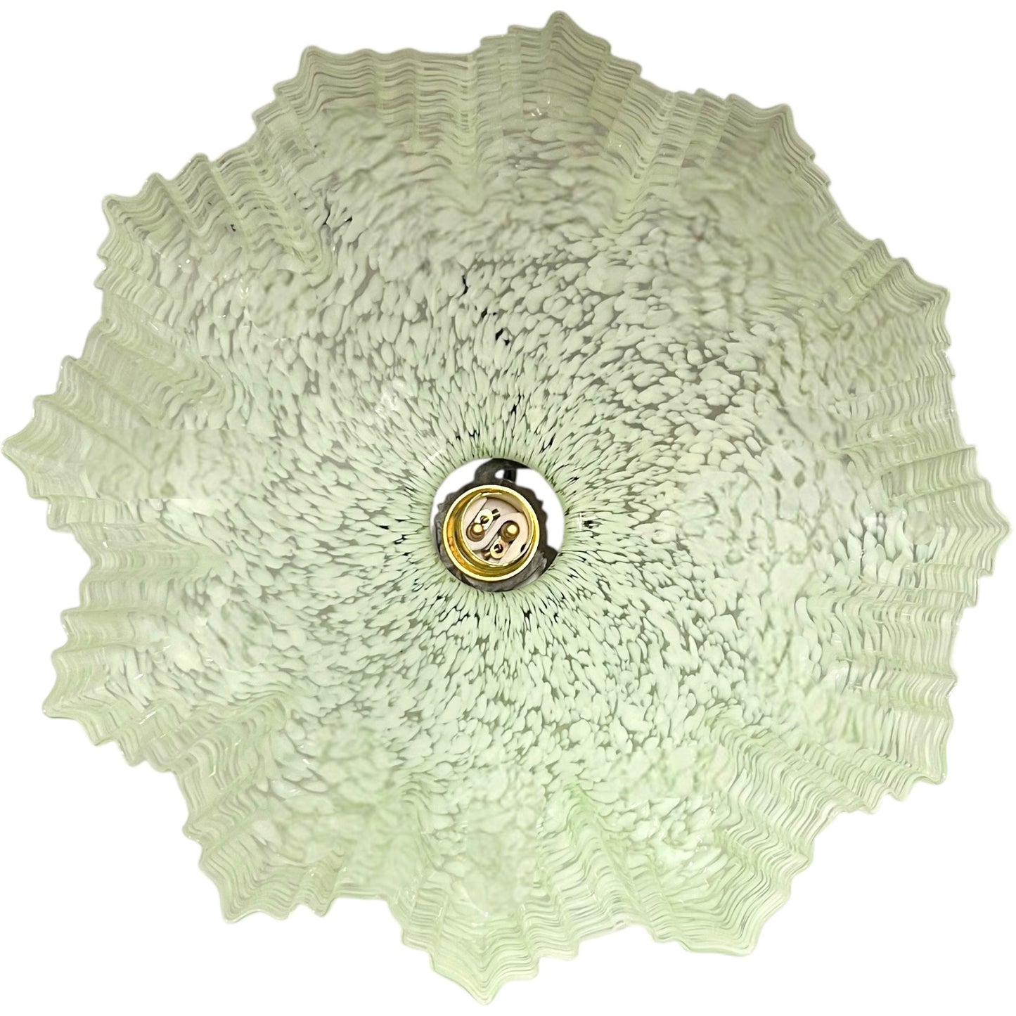 close up of inside light green milk glass pendant shade on a white background