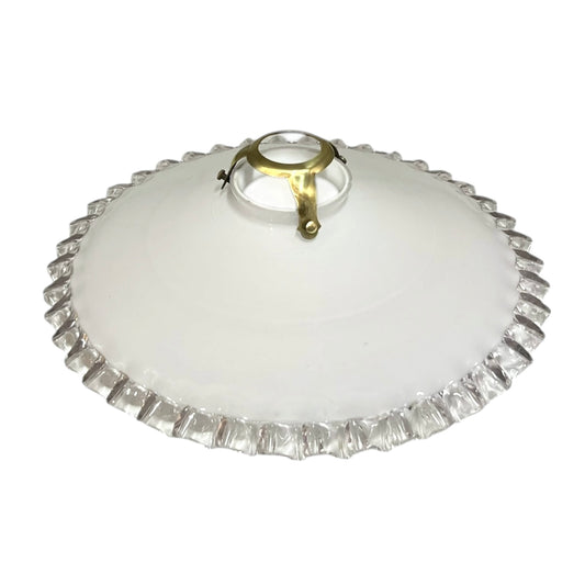 White glass lampshade with a gold fixture on a white background