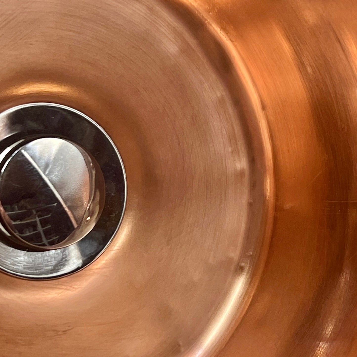 Copper upcycled basin sink or washbowl showing wear and tear
