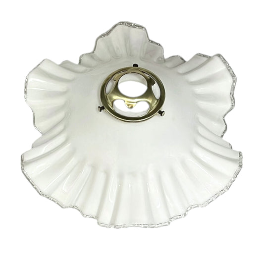 White glass lampshade with scalloped edge on a white background