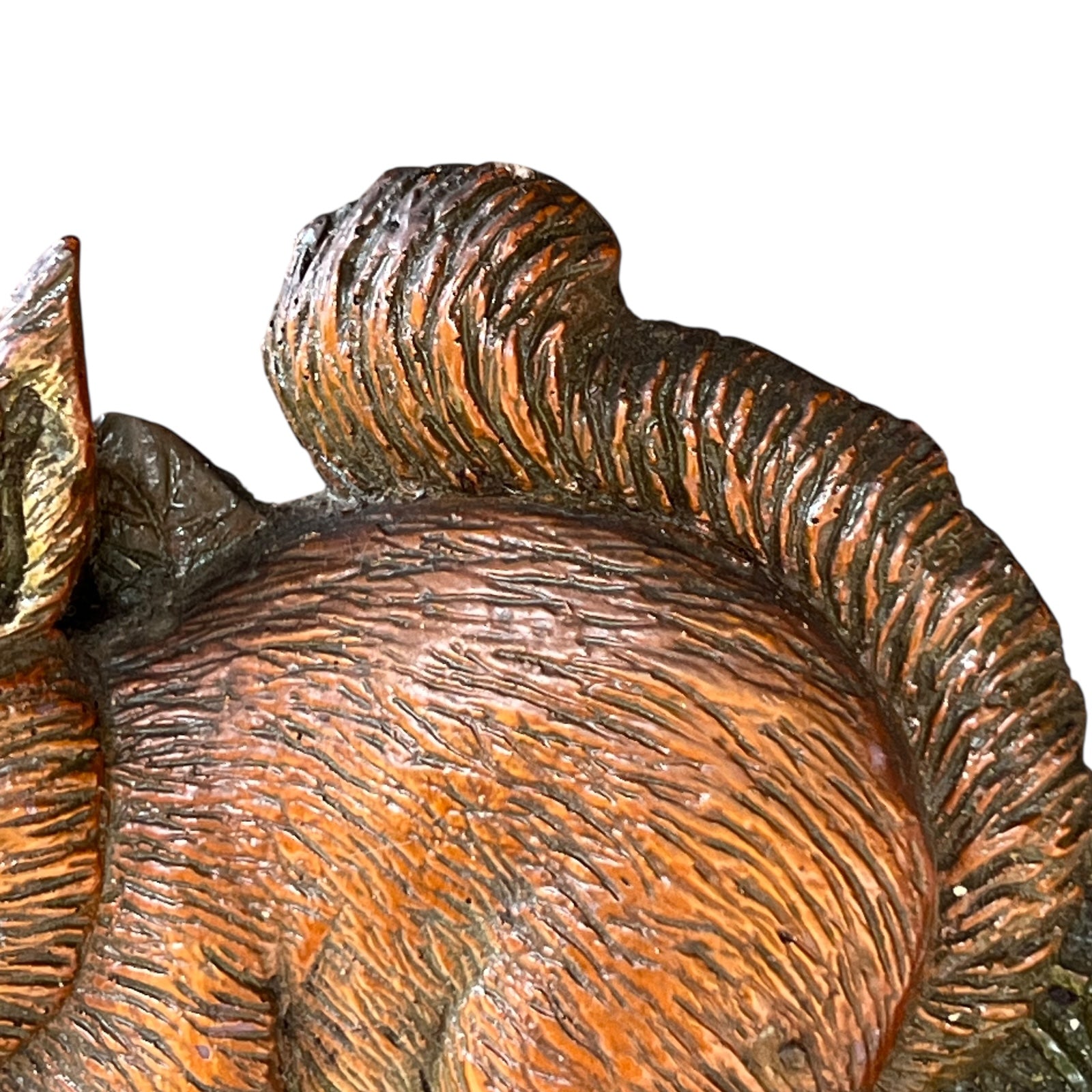 squirrel detail on rim of clock