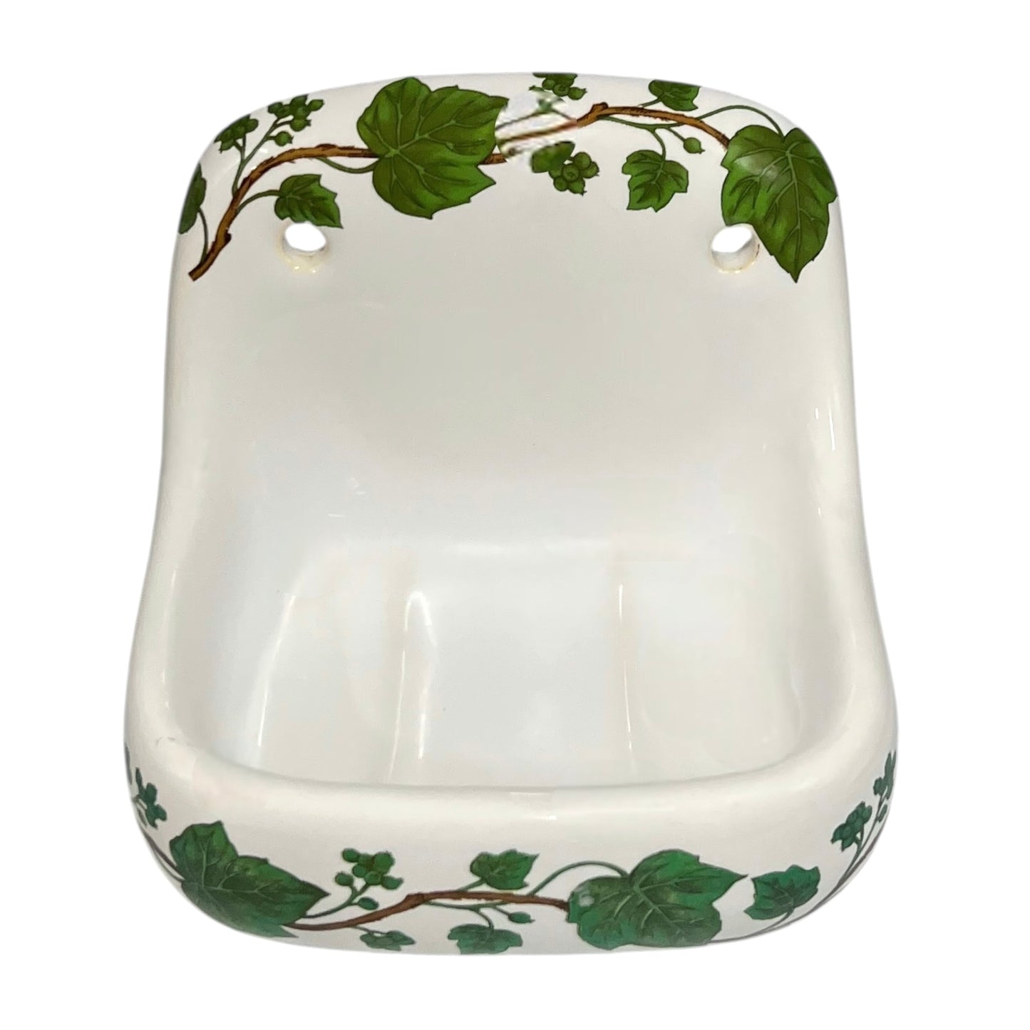 Porcelain bathroom soap dish featuring green leaf patterns on a white background