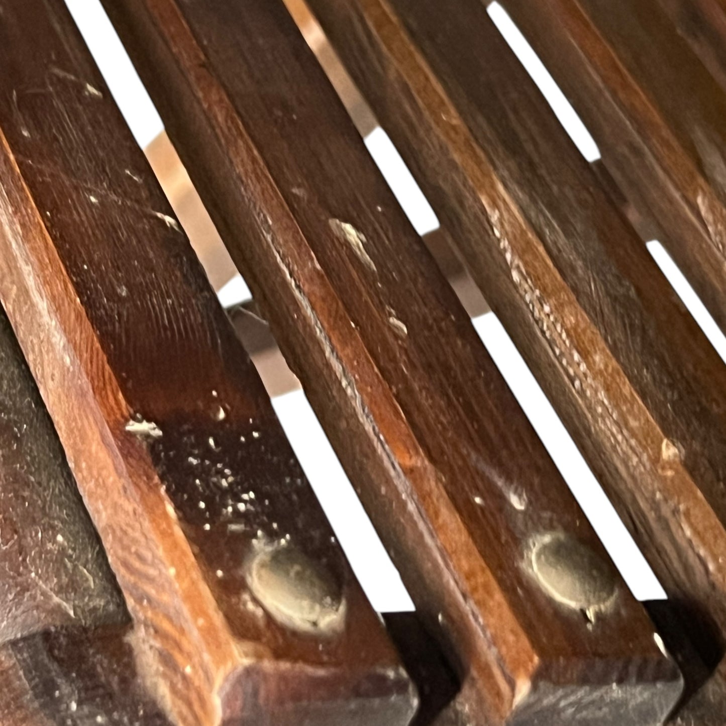 slotted wood on footstool
