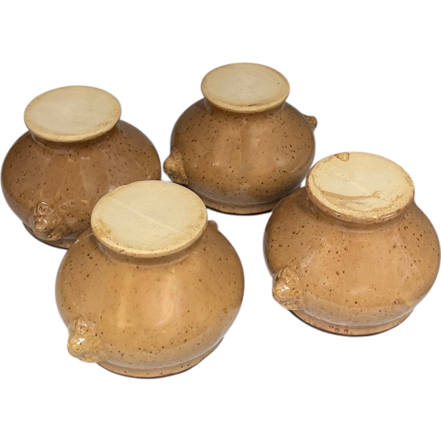 close up of soup bowls on a white background