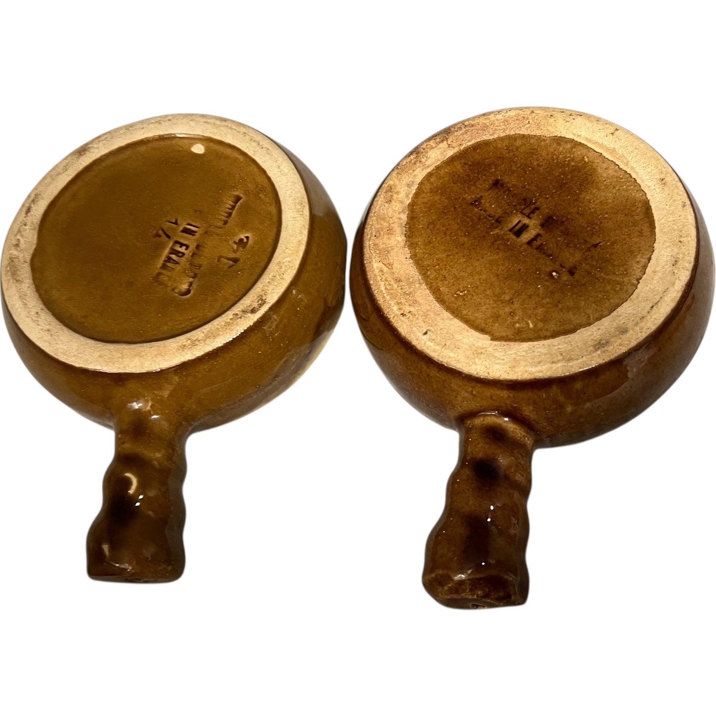 pair of 6 hole brown ceramic escargot plate reverse side