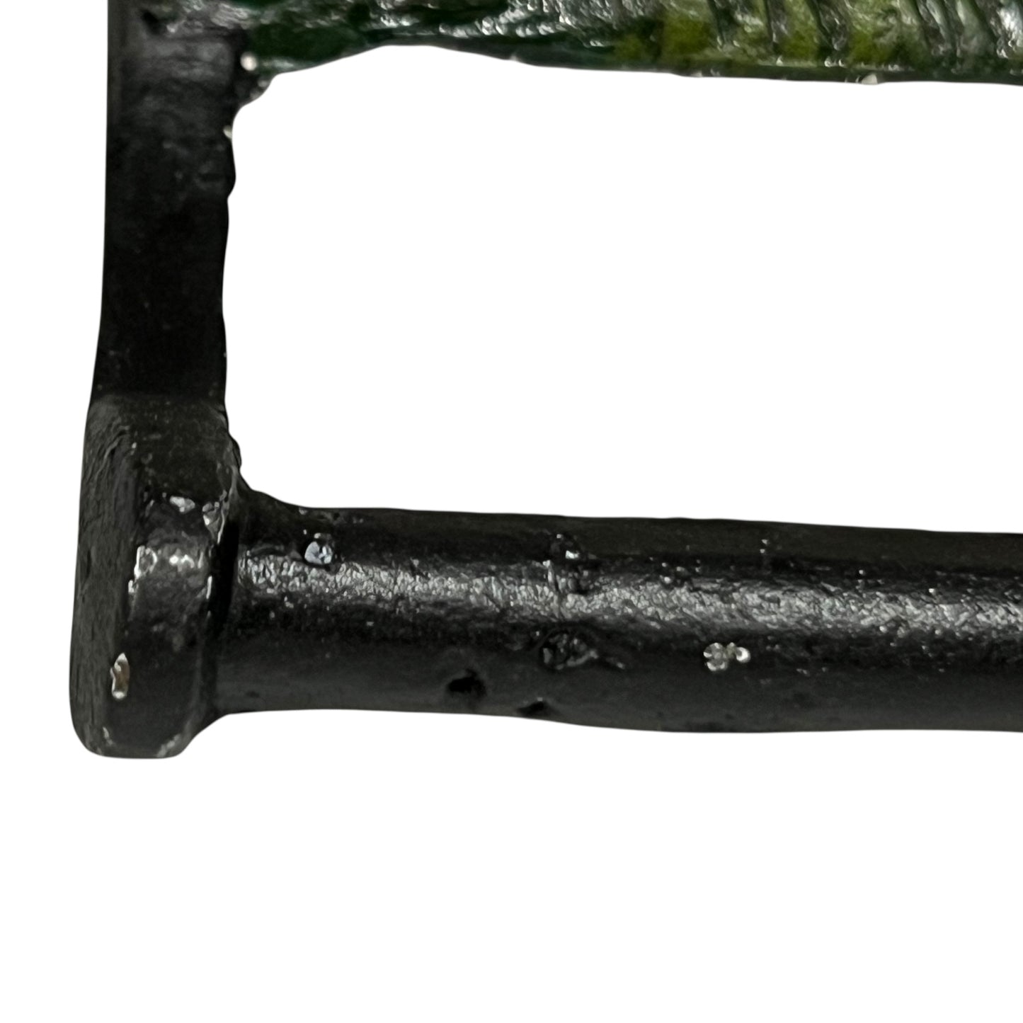 Close up of white horse toilet paper holder against a white background